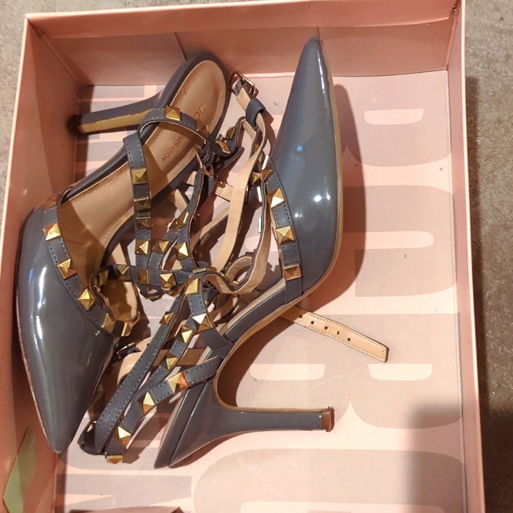 Well worn BCBG spiky strap heels